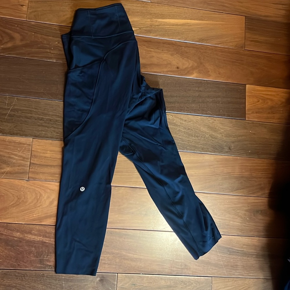 Lululemon Fast and Free collection size 14 black leggings never worn. Perfect .